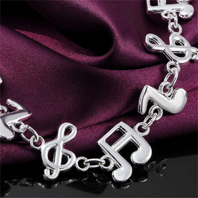 Srebrzysta bransoletka łańcuszkowa dla kobiet - nowoczesny design, solidna jakość - Wianko - 2