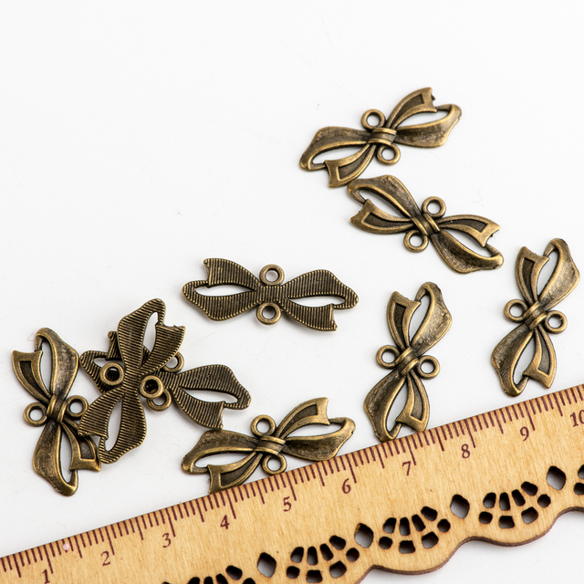 Metalowe złącze muszka do wyrobu biżuterii - komponenty jubilerskie DIY - Wianko - 1