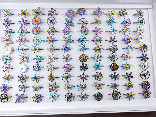 Pierścionki obracające się dla dzieci - zestaw 10 sztuk z pięknymi metalowymi kwiatowymi wzorami - Wianko - 2