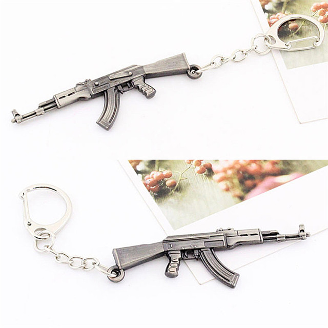 Breloczek pistolet - nowość, rozmiar 6cm, dla mężczyzn i dziewczynek - Wianko - 1