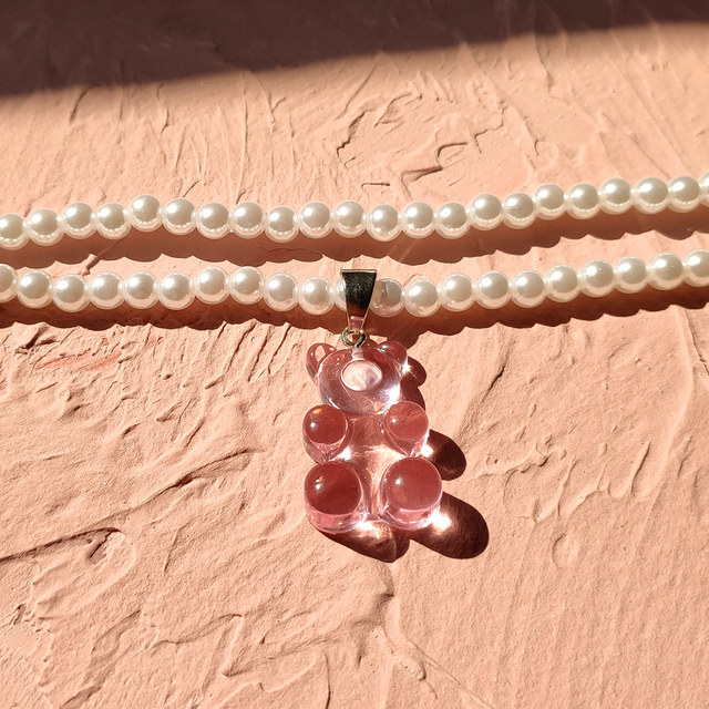 Wisiorek Gummy z bobasem i perłą - transparentny, dwuwarstwowy naszyjnik dla kobiet - Wianko - 7