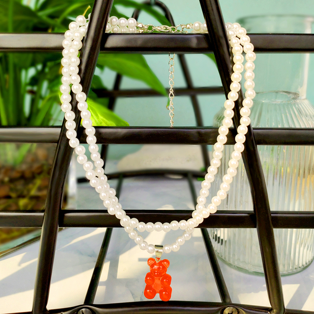 Wisiorek Gummy z bobasem i perłą - transparentny, dwuwarstwowy naszyjnik dla kobiet - Wianko - 9
