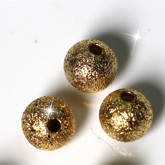 Złote koraliki Stardust o średnicy 6 mm do tworzenia biżuterii wysokiej jakości - 0.6*0.6*0.6 cm - Wianko - 3