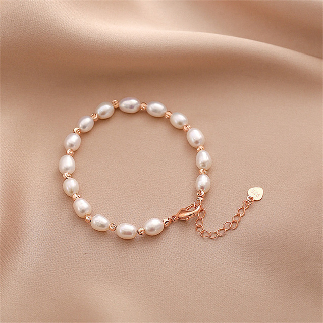 Elegancka bransoletka z naturalną perłą słodkowodną i srebrem pr.925 - Wianko - 7