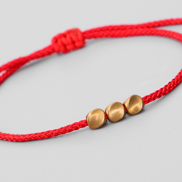 Ręcznie robione tybetańskie bransoletki buddyzmu - szeroki czerwony sznurek, miedziane koraliki - Wianko - 5