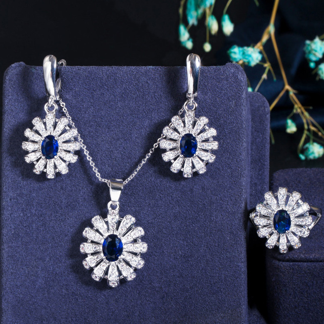 Przetworzenie podanego tytułu może wyglądać następująco: Zestaw biżuterii Pera Fashion - duży okrągły naszyjnik, kolczyki i pierścień. Koreańska marka, design królewska niebieska cyrkonia - Wianko - 19