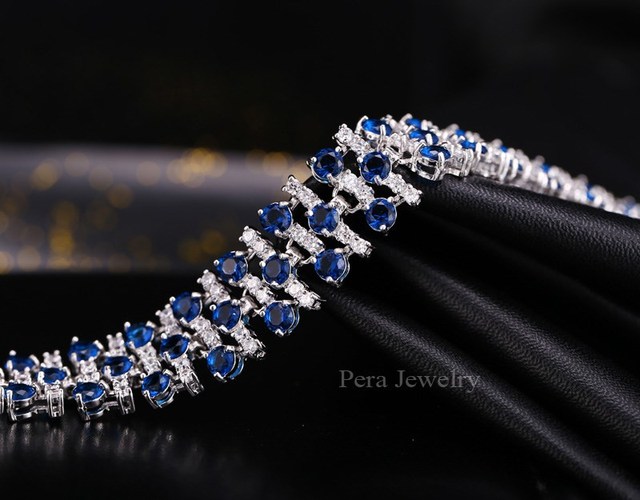Elegancka królewska biżuteria Pera CZ z białym kamieniem i białym złotem - duża bransoletka i Bangles dla kobiet B034 - Wianko - 9