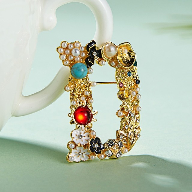 Nowa broszka Rinhoo - luksusowe litery D, wykwintne, eleganckie. Broszka z imitacji diamentu, ozdobiona perłami. Kolorowa moda, idealny prezent dla kobiet - Wianko - 42