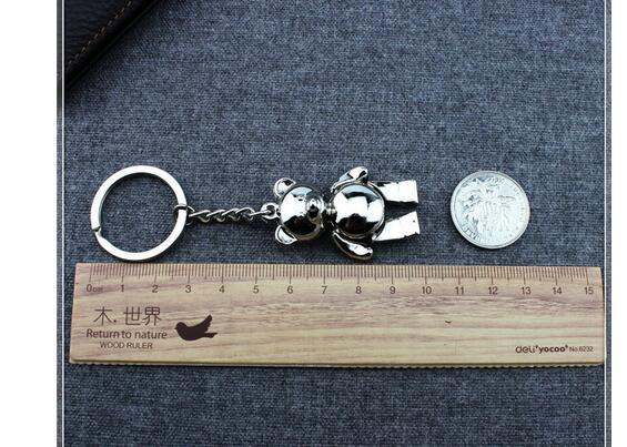 Breloki na klucze - Piękny metalowy breloczek z niedźwiedziem, wykonany ze stopu cynkowego, długość 10cm - Wianko - 8