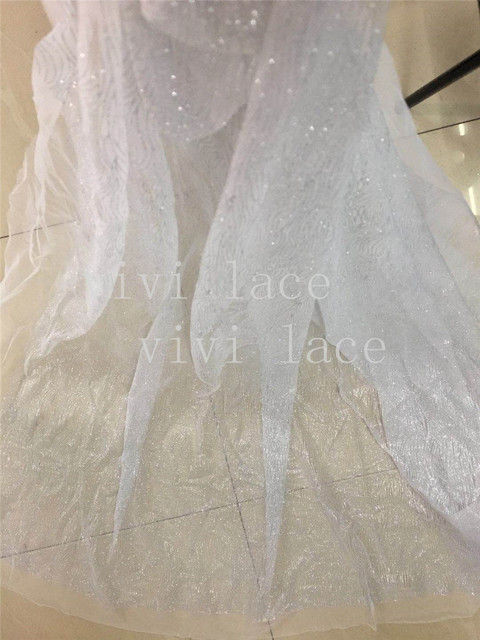 Materiał na suknię ślubną - 8 metrów nowej, wysokiej jakości tkaniny z afrykańskim wzorem brokatu w proszku srebrnego na siatce offwhite (NE013) - Wianko - 7