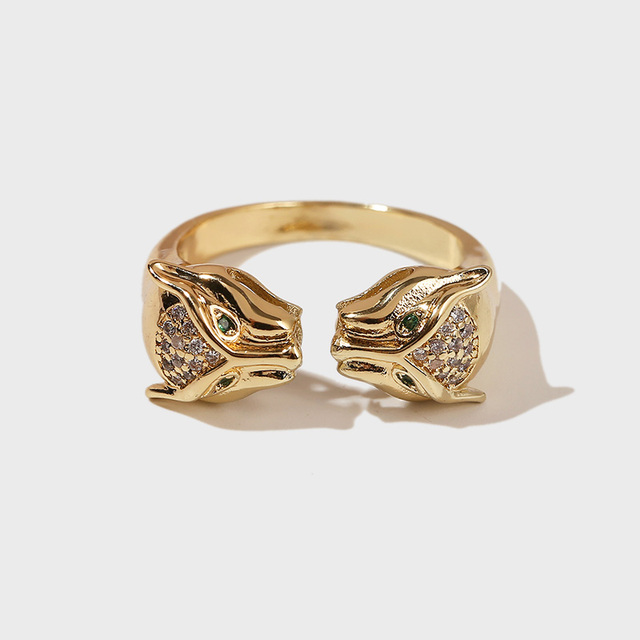 Regulowany pierścień z wysokiej jakości miedzi w złotym kolorze, ozdobiony metalowymi elementami w kształcie podwójnej głowy leoparda i cyrkonią, idealny na imprezę - Wianko - 5