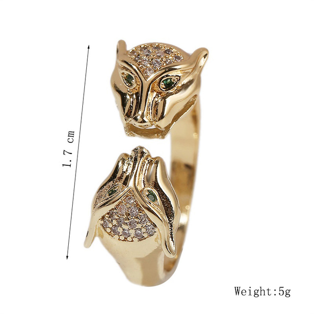 Regulowany pierścień z wysokiej jakości miedzi w złotym kolorze, ozdobiony metalowymi elementami w kształcie podwójnej głowy leoparda i cyrkonią, idealny na imprezę - Wianko - 1