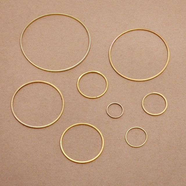 50 sztuk mosiężnych okrągłych wisiorków do tworzenia biżuterii - bransoletki, kolczyki DIY - Wianko - 5