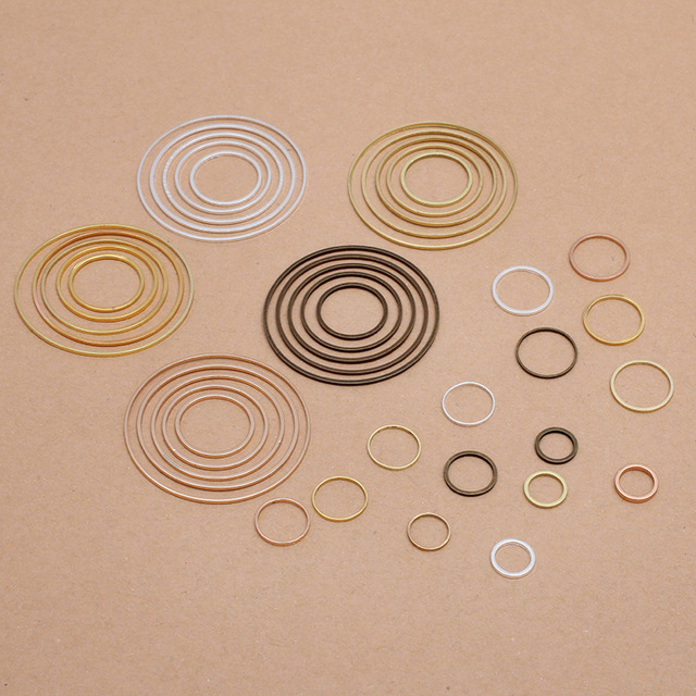 50 sztuk mosiężnych okrągłych wisiorków do tworzenia biżuterii - bransoletki, kolczyki DIY - Wianko - 3