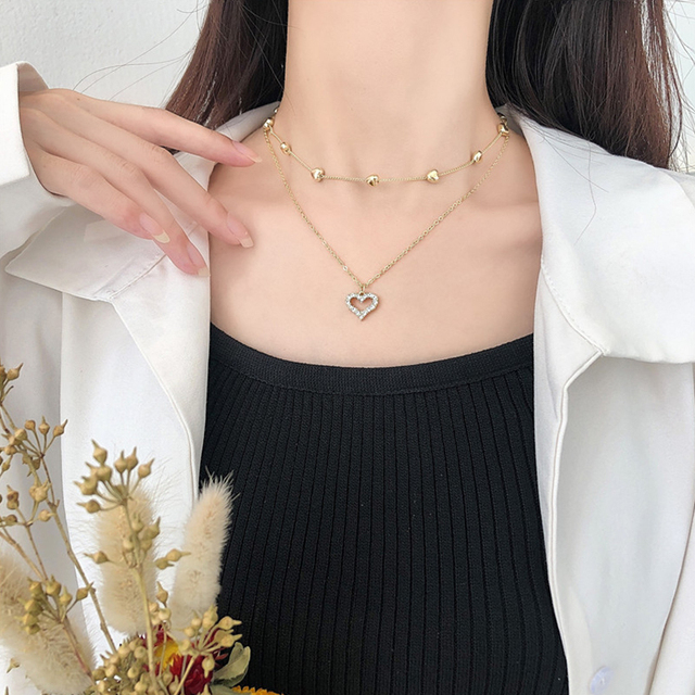 Koreański naszyjnik z wisiorkiem w kształcie serca - Biżuteria damskiego wieczoru ze złota i kryształów z romantycznym, wyciętym wzorem - Wianko - 3