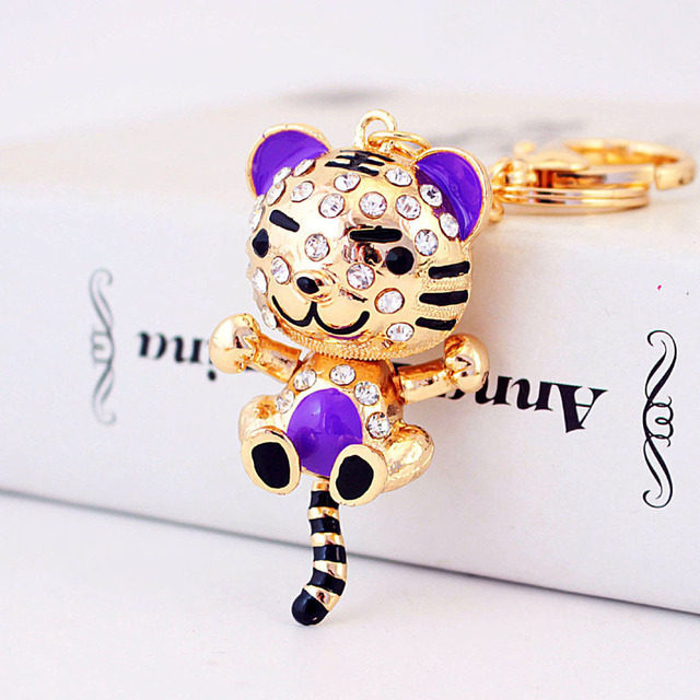 Breloczek na klucze - Nowa modna biżuteria z podobizną krowy - 12 zodiakalnych myszy jako prezent dla par - złote kryształy w stopie tytanu - Wianko - 22