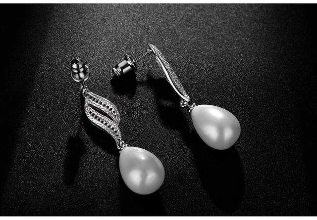 Luoteemi - Eleganckie kolczyki wiszące z białą kroplą wodną, perłami i cyrkoniami - Srebrny kolor - Biżuteria ślubna - Wianko - 12