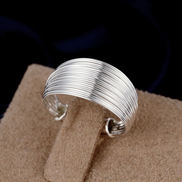 Posrebrzane obrączki ślubne z inkrustowanymi kryształami - nowoczesna biżuteria dla nowożeńców - Wianko - 8