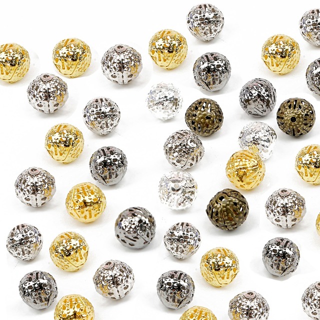 Koraliki metalowe dystansowe puste w środku różne rozmiary złoty/rodzaj brązowy kwiaty wzór piłki Handmade - Wianko - 1