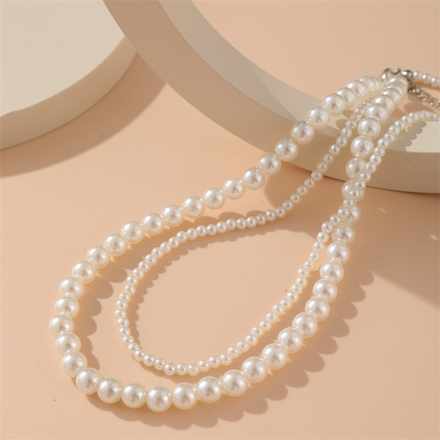 Naszyjnik Vintage z wielowarstwowymi sztucznymi perłami i prostym łańcuchemNaszyjnik łańcuszek Choker z vintage sztucznymi perłami dla kobiet - Wianko - 5
