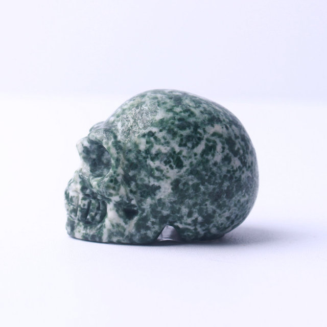 Kryształowa statua głowy czaszki ze zielonym kamieniem - Wianko - 3