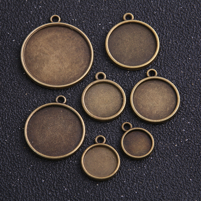 10 sztuk antycznych brązowych dwustronnych okrągłych ustawień Cabochon biżuteryjnych o średnicy 10 mm-25 mm - Wianko - 1