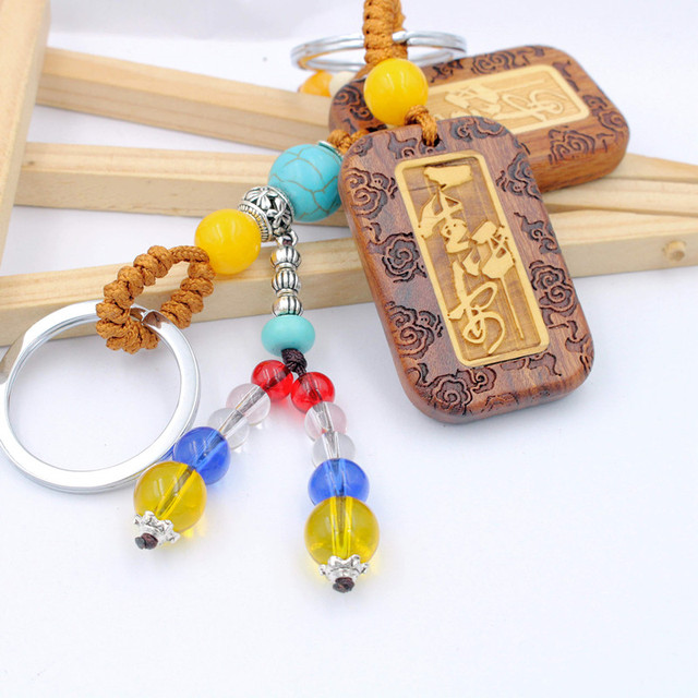 Brelok do kluczyków z drewnianą gruszką - zawieszka na torby z boginią miłosierdzia - prezenty, charms 228 - Wianko - 11