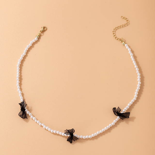 Nowoczesny naszyjnik z perłą i kamieniem Choker Tocona będący elegancką biżuterią dla kobiet i dziewcząt. Modny, dostosowywany kołnierz w kolorze czarnym z koronkowym wzorem - 20343 - Wianko - 3