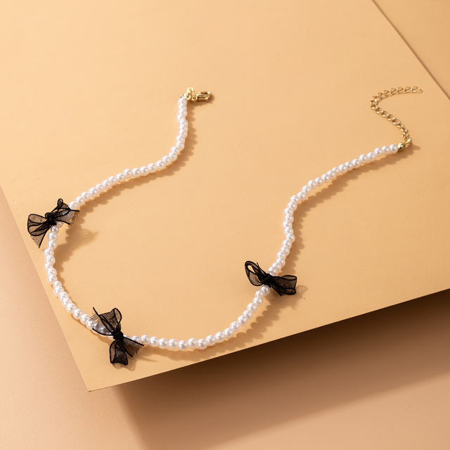 Nowoczesny naszyjnik z perłą i kamieniem Choker Tocona będący elegancką biżuterią dla kobiet i dziewcząt. Modny, dostosowywany kołnierz w kolorze czarnym z koronkowym wzorem - 20343 - Wianko - 4