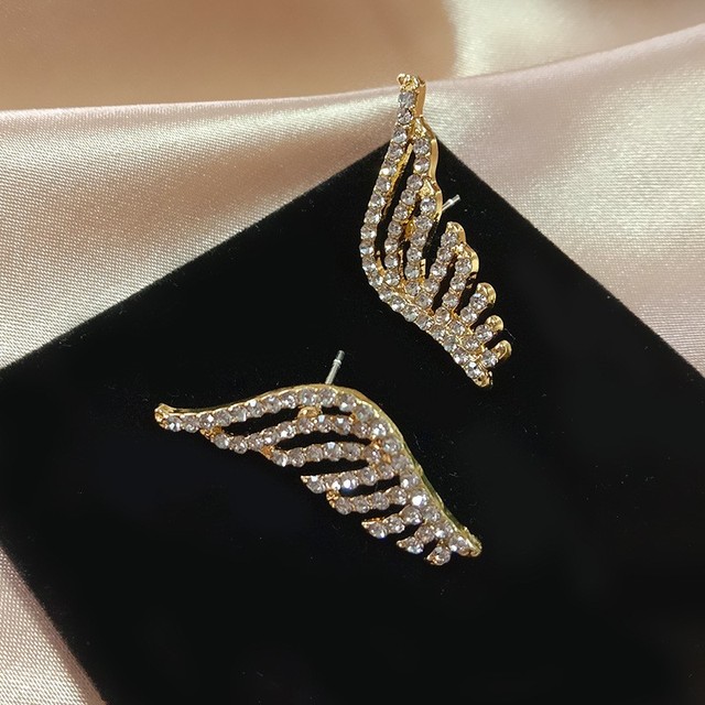 Srebrne kolczyki z zapięciem sztyft, wyłożone kryształkami w kształcie skrzydeł, biżuteria dla osób poszukujących nowoczesnych dodatków - Wianko - 37