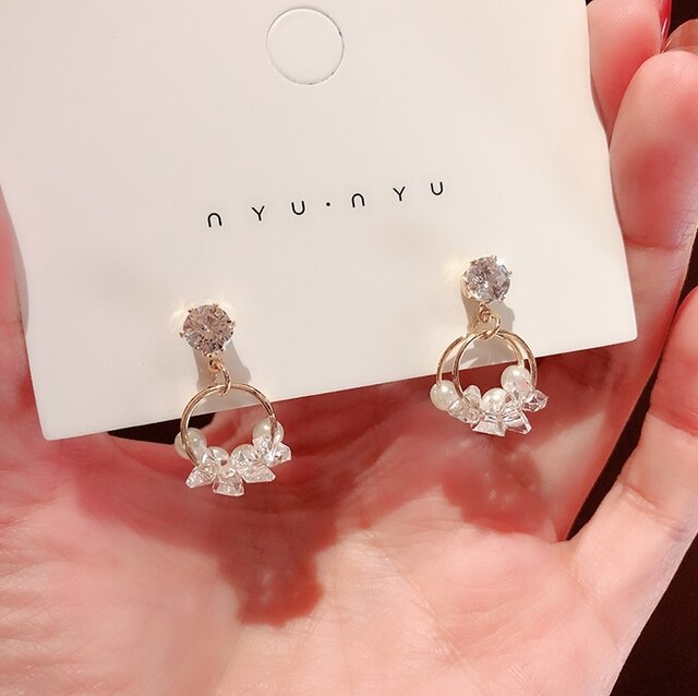 Srebrne kolczyki z zapięciem sztyft, wyłożone kryształkami w kształcie skrzydeł, biżuteria dla osób poszukujących nowoczesnych dodatków - Wianko - 13