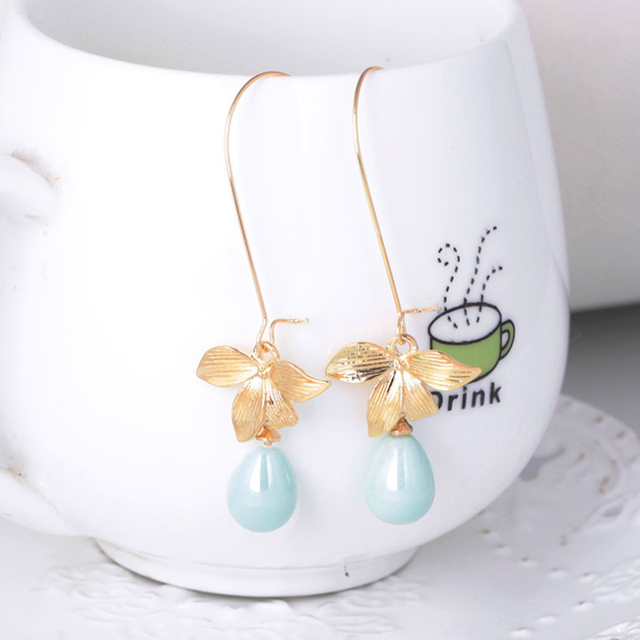Złoty kolczyk w kształcie orchidei, imitacja zielonej perły, szydełkowe zwisające, kobiece, moda, styl boho, Dangle Piercing biżuteria - Wianko - 1