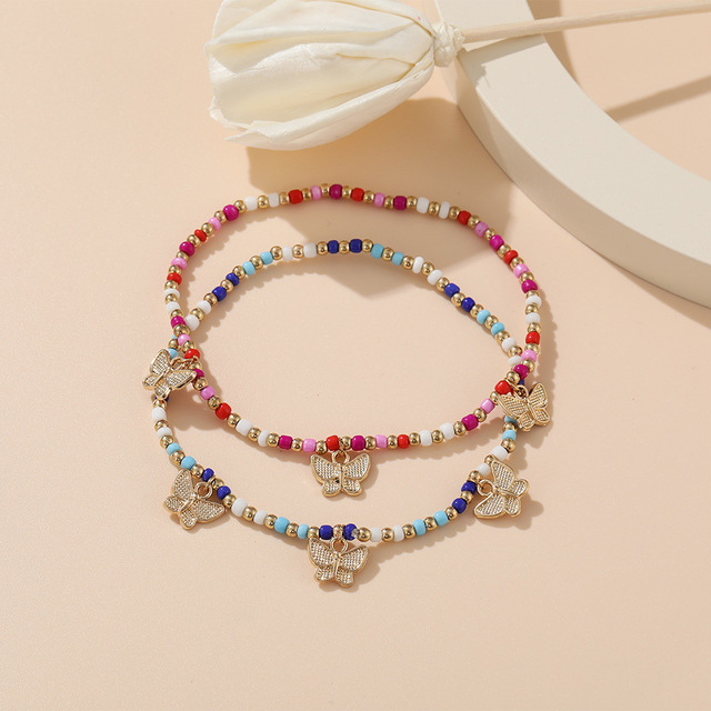 Zestaw dwóch plecionych bransoletek - kolorowe koraliki ryżowe z motywem motyla, liny łańcuchowe - biżuteria na plażę - Wianko - 4