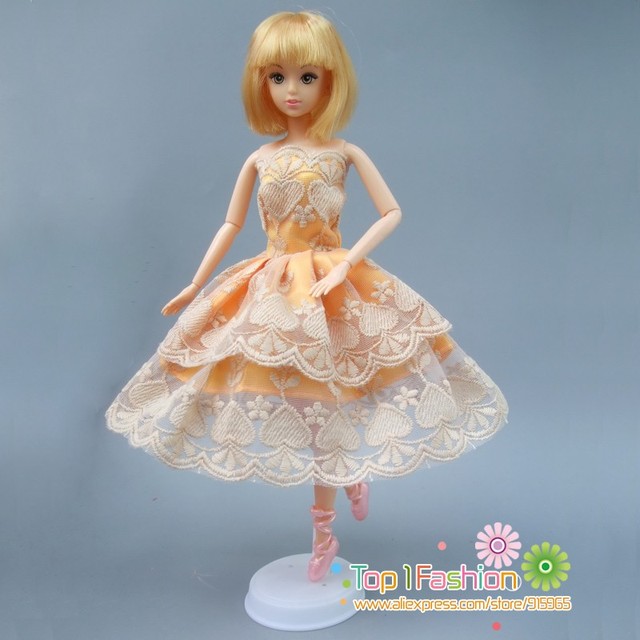 Krótka żółta sukienka dla Barbie - darmowa wysyłka, idealna na urodziny lub noworoczny prezent dla dziewczynki - Wianko - 1
