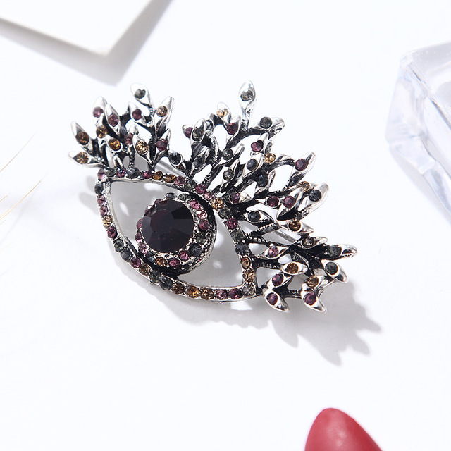 Czarna broszka w kształcie oka z kryształami – elegancka i neogotycka biżuteria damska - Wianko - 18