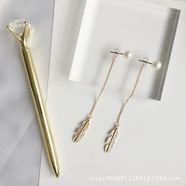 Kolczyki wiszące Europejska i amerykańska moda - Retro długi wiszący łańcuszek z pióropuszem i imitacją perły - Wianko - 36