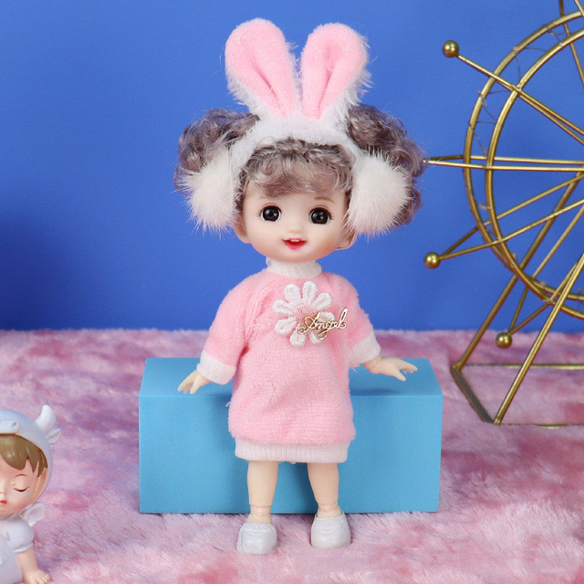 Lalka księżniczka o wysokości 16 cm z 13 wymiennymi elementami ubioru i uśmiechem - idealna zabawka dla dzieci - Wianko - 10