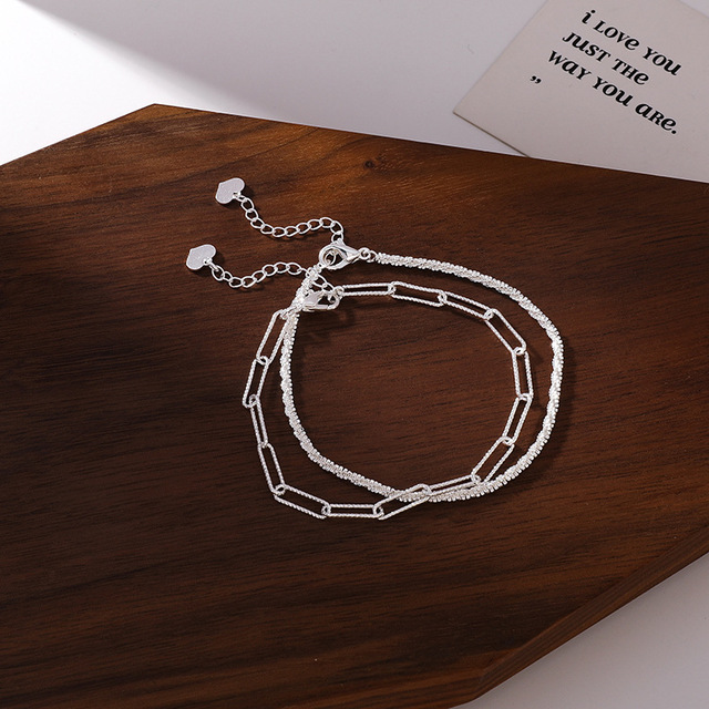 Elegancka minimalistyczna bransoletka z lśniącym, masywnym łańcuszkiem i unikalnym charms sercem - dla kobiet i dziewcząt - Wianko - 8