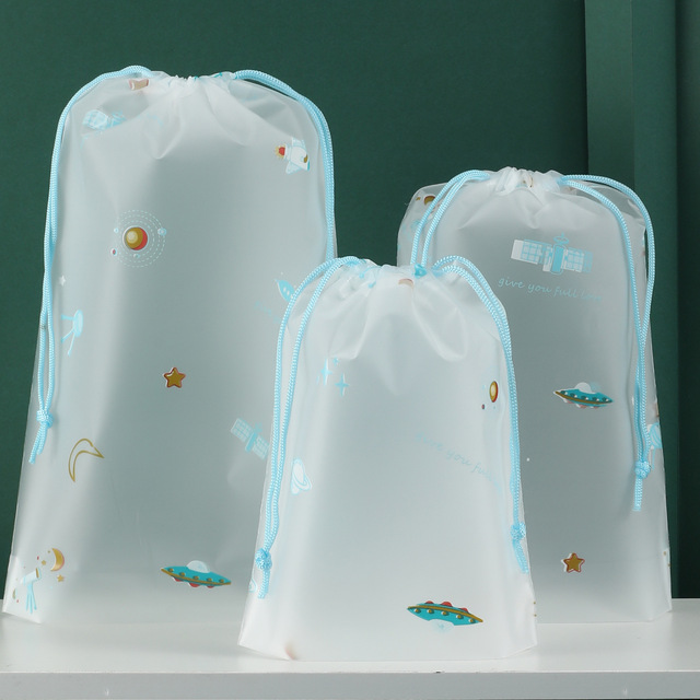 Torba kosmetyczna do przechowywania - 5 sztuk przezroczystych wodoodpornych plastikowych toreb z sznurkiem, idealne na podróże - organizer na ubrania i obuwie, kosmetyczka z motywem kreskówki - Wianko - 18