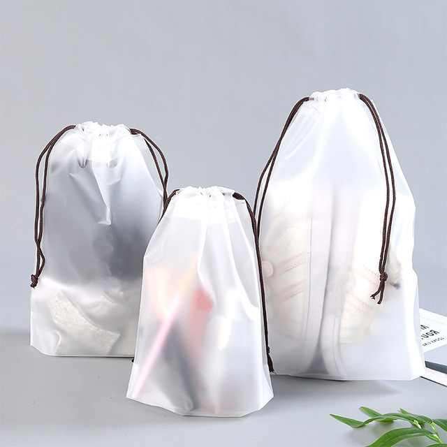 Torba kosmetyczna do przechowywania - 5 sztuk przezroczystych wodoodpornych plastikowych toreb z sznurkiem, idealne na podróże - organizer na ubrania i obuwie, kosmetyczka z motywem kreskówki - Wianko - 17