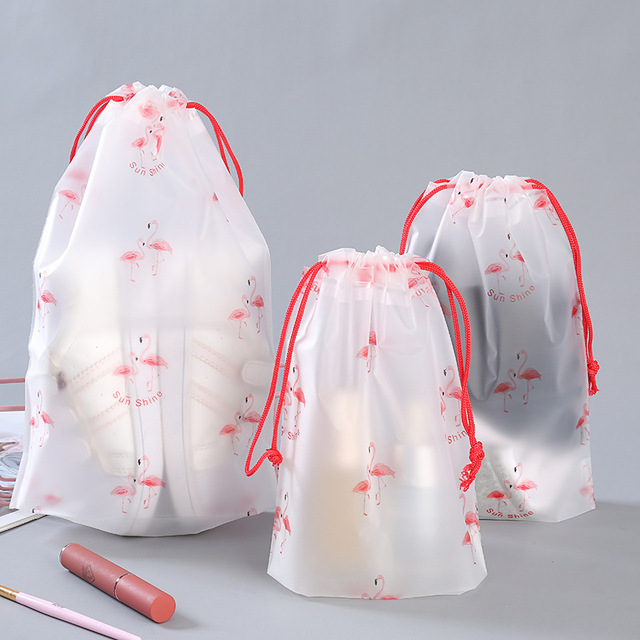 Torba kosmetyczna do przechowywania - 5 sztuk przezroczystych wodoodpornych plastikowych toreb z sznurkiem, idealne na podróże - organizer na ubrania i obuwie, kosmetyczka z motywem kreskówki - Wianko - 25