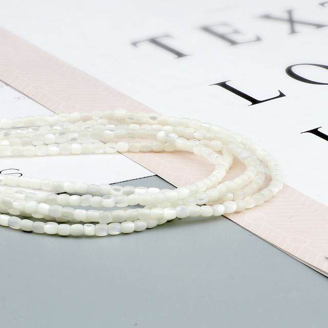 Naszyjnik Handmade z białymi naturalnymi matkami perłowymi w kształcie okręgu i krzyżem - Wianko - 10