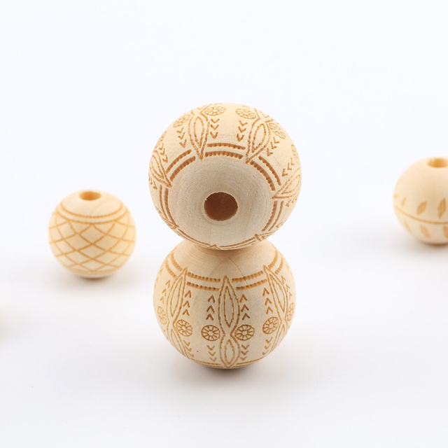 Akcesoria do tworzenia biżuterii - Naturalne drewniane koraliki okrągłe 20-25mm z kwiatowym wzorem dla dzieci (luzem) - Wianko - 4