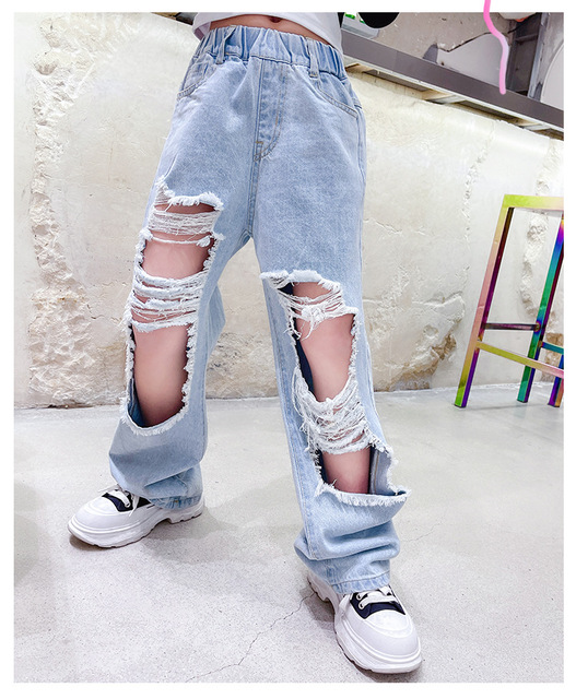 Nastolatki - Niebieskie jeansowe dżinsy dla dziewczyn z wysokim stanem i rozszerzanymi nogawkami - Wianko - 6
