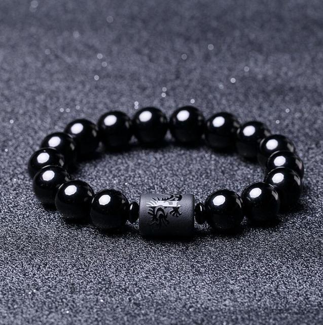 Pleciona bransoletka z naturalnym czarnym obsydianem o średnicy 10 mm, z rzeźbionym amuletem budda na szczęście - biżuteria unisex - Wianko - 1