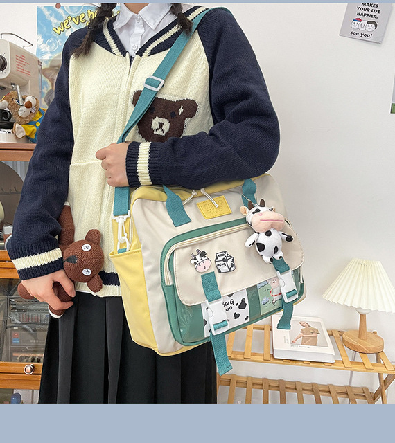 Koreański plecak wielofunkcyjny dla nastolatek, przenośna torba podróżna dla dziewczynki - krowa, mała słodka szkolna torba z różową odznaką kobiecego stylu - Wianko - 4