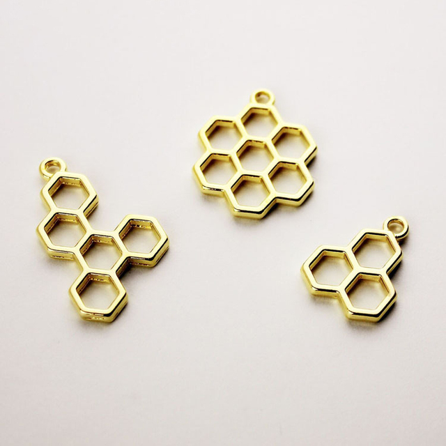 Hollow Bee Honeycomb - 10 sztuk/partia - Wielokątne UV Biżuteria DIY - Charms, Wisiorki, Akcesoria Materiał - Wianko - 1