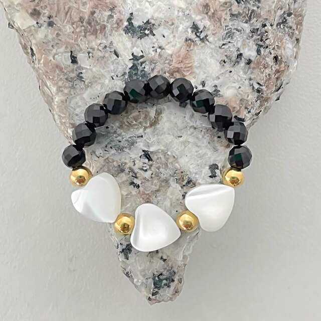 Pierścień kobiecy z czarnego kamienia imitujący białą perłę, ze stali nierdzewnej, z regulowanymi złotymi koralikami - Wianko - 8
