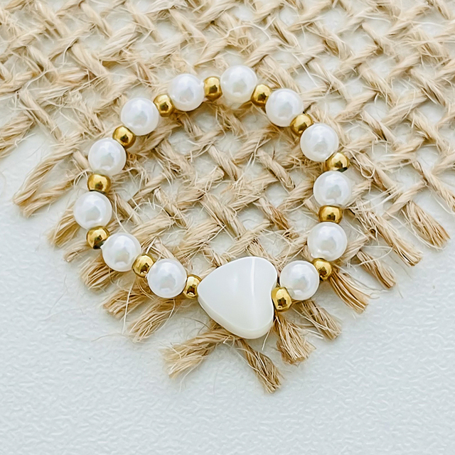 Pierścień kobiecy z czarnego kamienia imitujący białą perłę, ze stali nierdzewnej, z regulowanymi złotymi koralikami - Wianko - 2