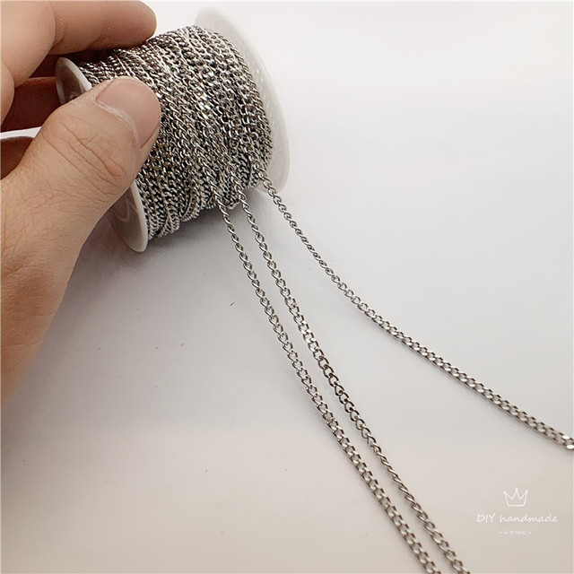 Link łańcucha metalowego ze stali nierdzewnej, srebrny, o szerokości 2.8 mm i grubości 1.3 mm, dostępny w długościach 5/10/20 m - idealny do tworzenia bransoletek, obojczyków i naszyjników - Wianko - 1